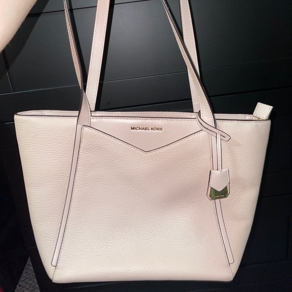 Rose gold Michael Kors purse